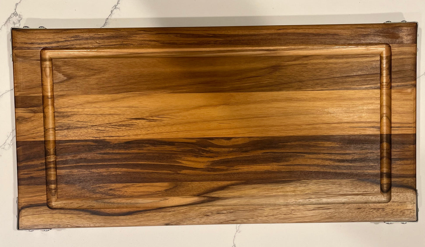 Handcrafted Teak Cutting Board with Industrial Accents