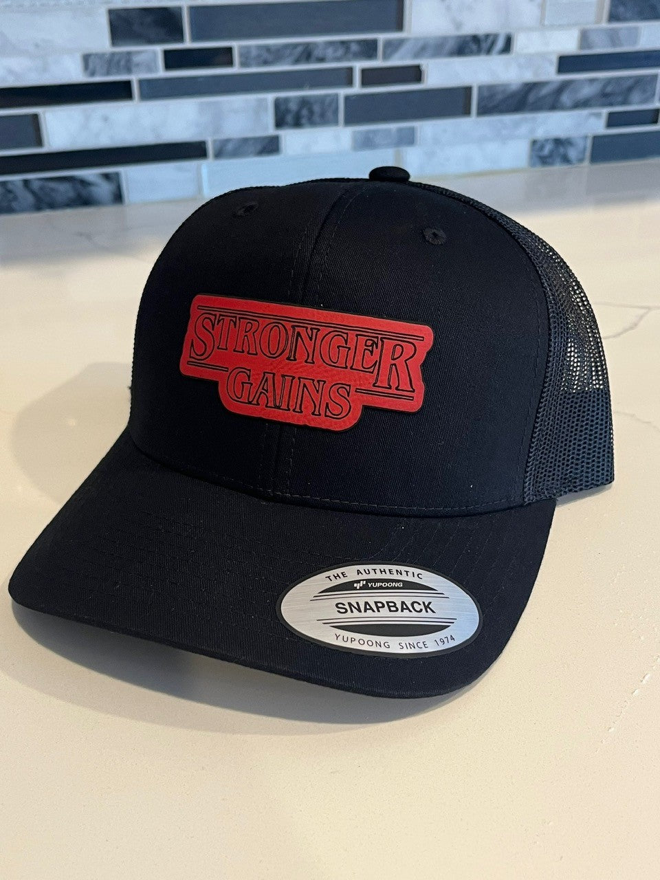 Stronger Gains Hat (Red and Black)